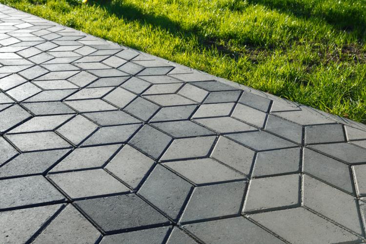 Concrete paver installed in outdoor space